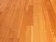 Reclaimed wood flooring sample showcasing natural grain and texture