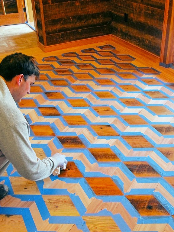 Working staining wood floor with E.T. Moore Sealers