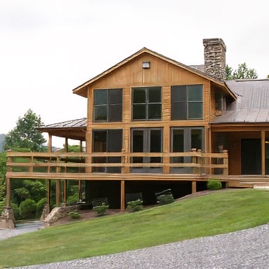 Private home near Wintergreen, Virginia. The client specified E.T. Moore to supply high-grade old growth cypress, a specialized wood not readily available, which was then custom-milled into German shiplap siding to exact specifications at our plant. - E.T. Moore Custom Home