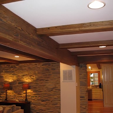 Timeless intimacy. Combine artisan stone, well-chosen decorative pieces, and the humble majesty of ancient reclaimed wood to create unique places your family will love and your friends will admire. - E.T. Moore Custom Home